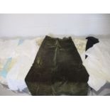 A selection of vintage linen, infants dresses, an adults long velvet skirt, an Edouard and Butler