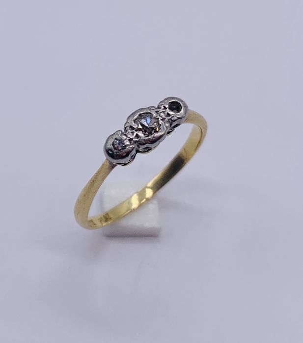 A scrap 18ct gold and platinum diamond three stone ring- 1 stone missing, weight 1.7g