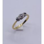 A scrap 18ct gold and platinum diamond three stone ring- 1 stone missing, weight 1.7g