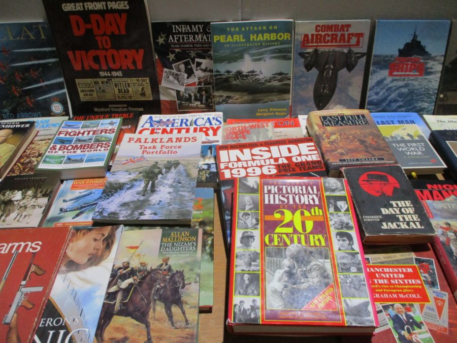 A large collection of books (mainly reference) on various subjects including military conflict &