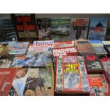 A large collection of books (mainly reference) on various subjects including military conflict &