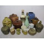 A collection of various studio pottery and stoneware pieces including lamps, vases, casserole