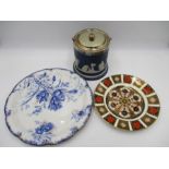 A Royal Crown Derby Imari plate (Pattern No 1128), along with a Adam's Jasperware biscuit barrel and