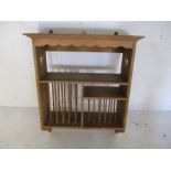 A pine wall hanging plate rack