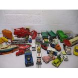 A collection of mainly agricultural and haulage trailers die cast includes Britains, Dinky, Corgi