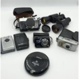 A small collection of cameras, binoculars etc including Minolta, Rollei, Walkman etc.