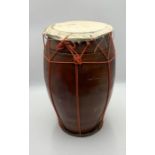 A wood and skin Bongo drum height 46cm diameter 25cm