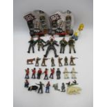 A small collection of lead soldiers and animals, along with plastic toy soldiers, two sealed Tech