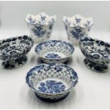 A small collection of blue and white china including a pair of terrines, plates and planters