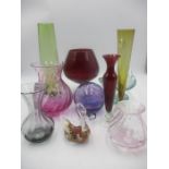 An assortment of vintage coloured glass.