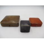 An antique leather ring box along with two similar boxes for brooches