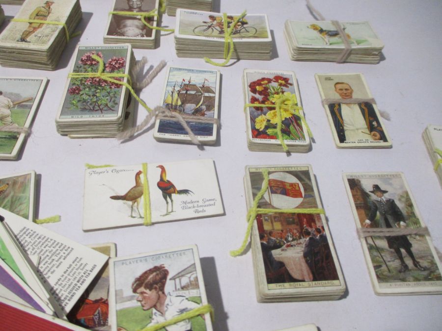 A collection of vintage cigarette cards including John Player & Sons, Churchman's, WD & HO Wills. - Image 10 of 11