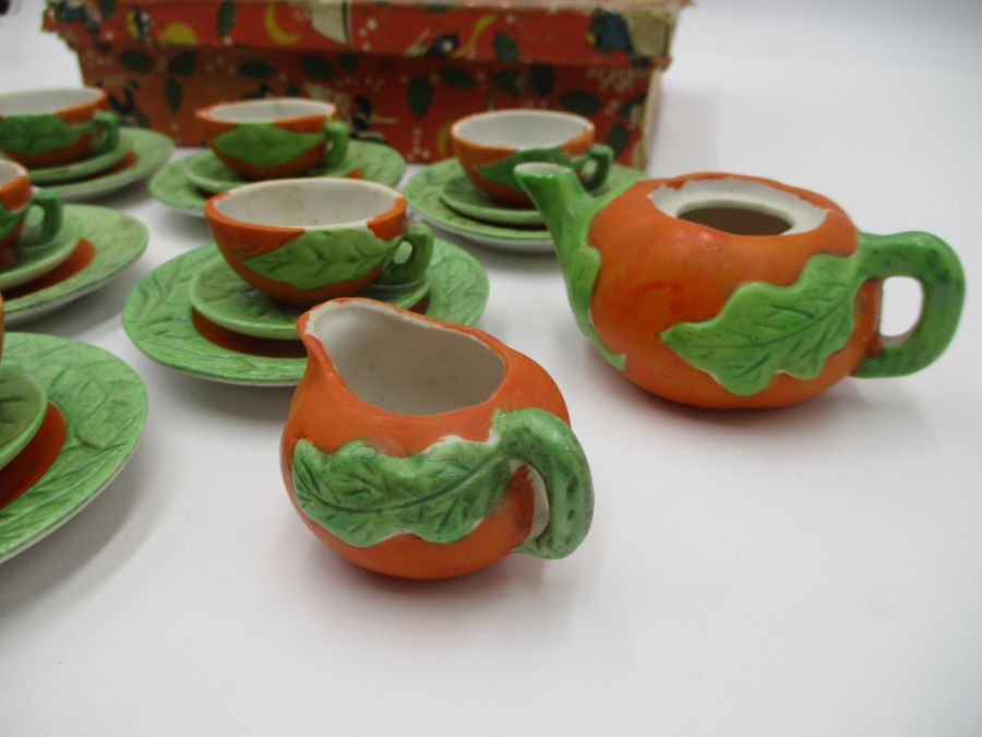 A child's vintage miniature tea set, pumpkin themed, marked "golden series rec. foreign". In a - Image 5 of 16