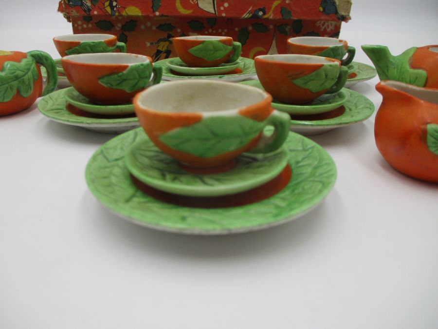 A child's vintage miniature tea set, pumpkin themed, marked "golden series rec. foreign". In a - Image 4 of 16