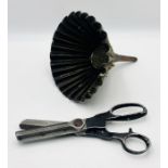 A fluted vintage copper funnel and set of pinking shears