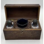 A mahogany tea caddy with blue glass mixing bowl and Chinese porcelain caddys with pewter hinged
