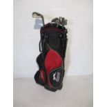 A set of Ping i3 golf irons in Slazenger carry bag. Irons included are 3 to 9 and a sand wedge.