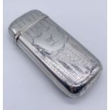 A hallmarked silver cigar case with hinged lid, by Nathaniel mills