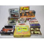 A collection of boxed die-cast vehicles including Atlas Editions Great British Buses, Corgi Buses,