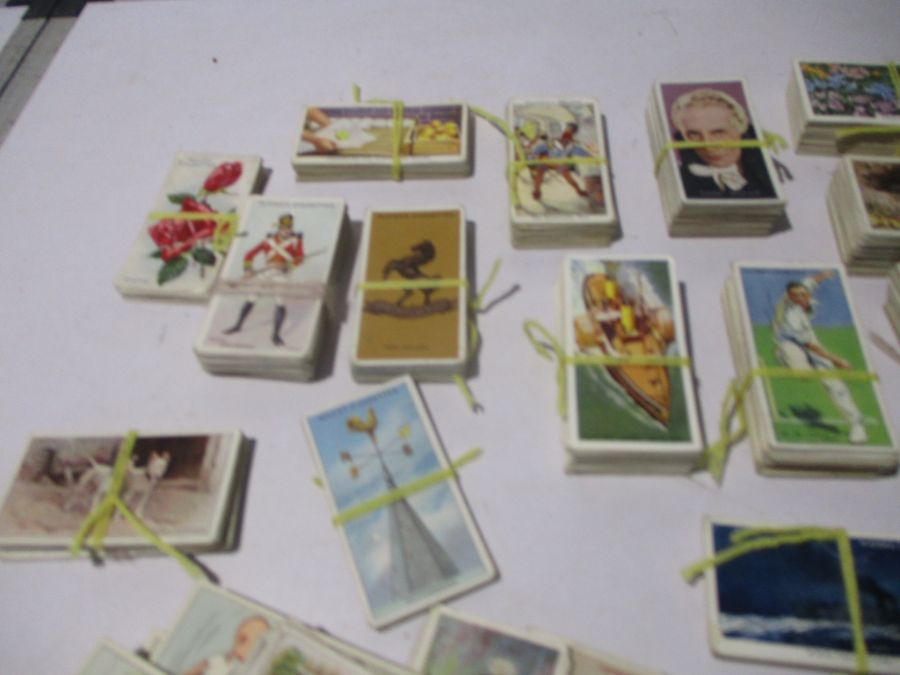 A collection of vintage cigarette cards including John Player & Sons, Churchman's, WD & HO Wills. - Image 8 of 11