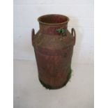 A rustic vintage milk churn stamped with C&G Pride Aux Ltd (Evercreech) - no lid