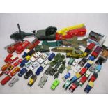 A collection of various loose play worn die-cast and toy vehicles included military, police, fire