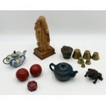 A collection of interesting items including Oriental green clay teapot, bronze nesting cup