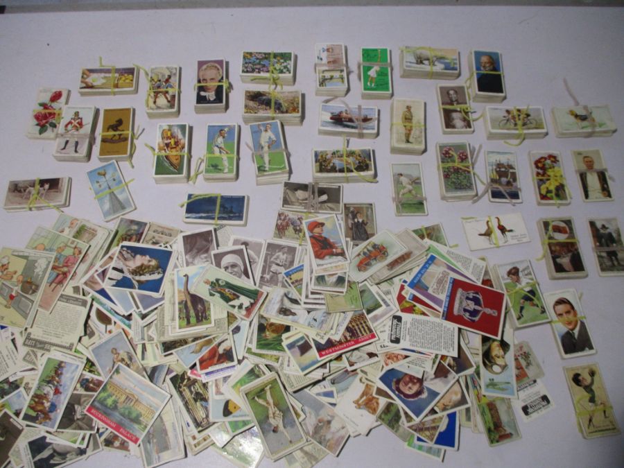 A collection of vintage cigarette cards including John Player & Sons, Churchman's, WD & HO Wills.