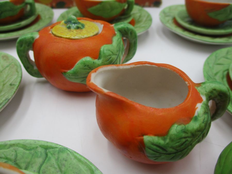 A child's vintage miniature tea set, pumpkin themed, marked "golden series rec. foreign". In a - Image 15 of 16