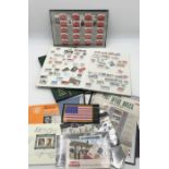 A collection of various stamps in two albums and others including a number from the USA and UK