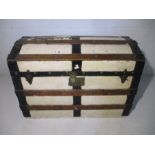 A vintage Saratoga dome topped trunk made by Thomas Russell, trunk manufacturers, Edinburgh.