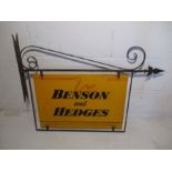 A vintage Benson and Hedges double sided metal advertising sign on cast iron bracket