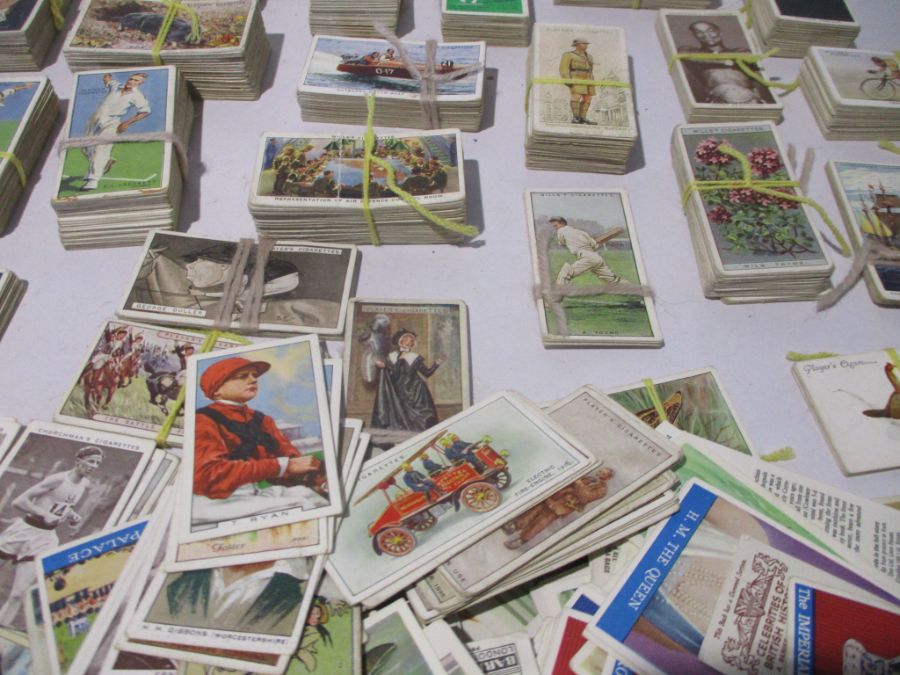 A collection of vintage cigarette cards including John Player & Sons, Churchman's, WD & HO Wills. - Image 9 of 11