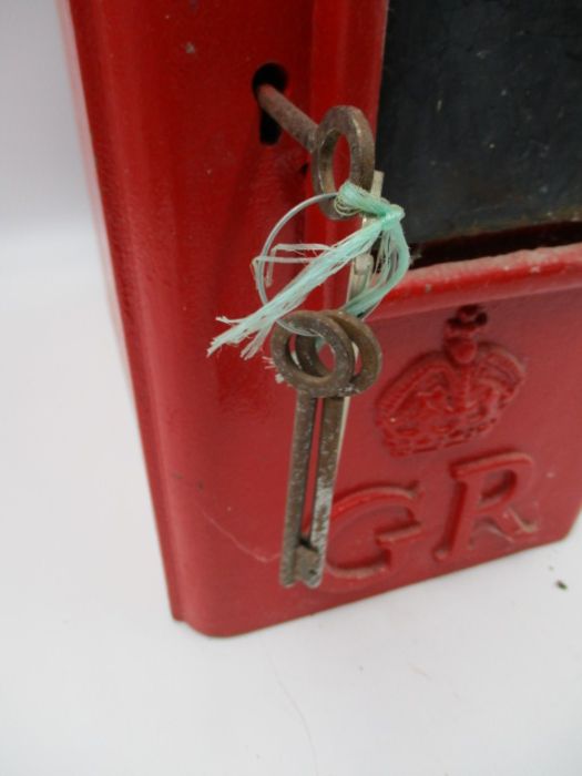 A cast iron Royal Mail letter box/postbox with a dome top and side mount fitments, stamp marked with - Image 8 of 11
