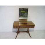 A vintage dressing table with three drawers