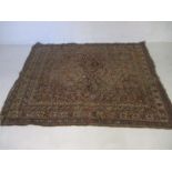 A vintage Eastern hand woven rug, 182cm x 150cm. A/F