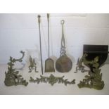 A brass fireside companion set including poker, tongs, fire dogs etc also includes a small wooden