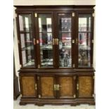 A large display cabinet with cupboard under in the Chinese style height 208cm width 262cm, depth