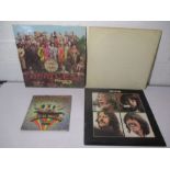 Vinyl- The Beatles- White album, with posters, serial number 0493008 along with Sgt Peppers Lonely