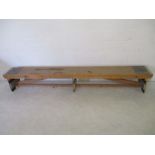 An industrial wooden bench from the Axminster Carpets factory - length 299cm, width 38cm, height