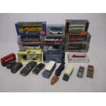 A collection of boxed die-cast vehicles including Corgi "The Original Omnibus Company" coaches,