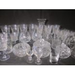 A collection of various cut glassware