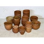A collection of various terracotta pots