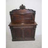 A Victorian mahogany chiffonier with carved decoration