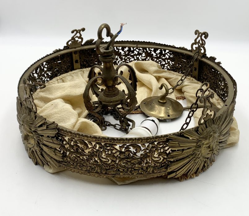 A gilt hanging light in the French style with sunburst cherub motifs and fabric drop shade - Image 2 of 4