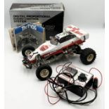 A Tamiya remote controlled car "The Frog" with accessories and radio control system - untested A/F