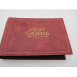 An album of vintage maritime postcards