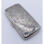 A Victorian hallmarked silver cigarette case with engraved decoration, Chester 1898