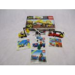 A collection of five sets of vintage Lego including a boxed Bulldozer (856), Classic Town Fire