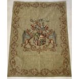 A large wall hanging showing an armorial crest 184cm x 134 cm